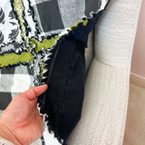 Handmade green, black, and white fish-themed rag quilt, designed for boys. This cozy fishing quilt is perfect for adding a touch of adventure to a boys room. Made with soft fabric, it offers comfort and durability, and is available for quick shipping